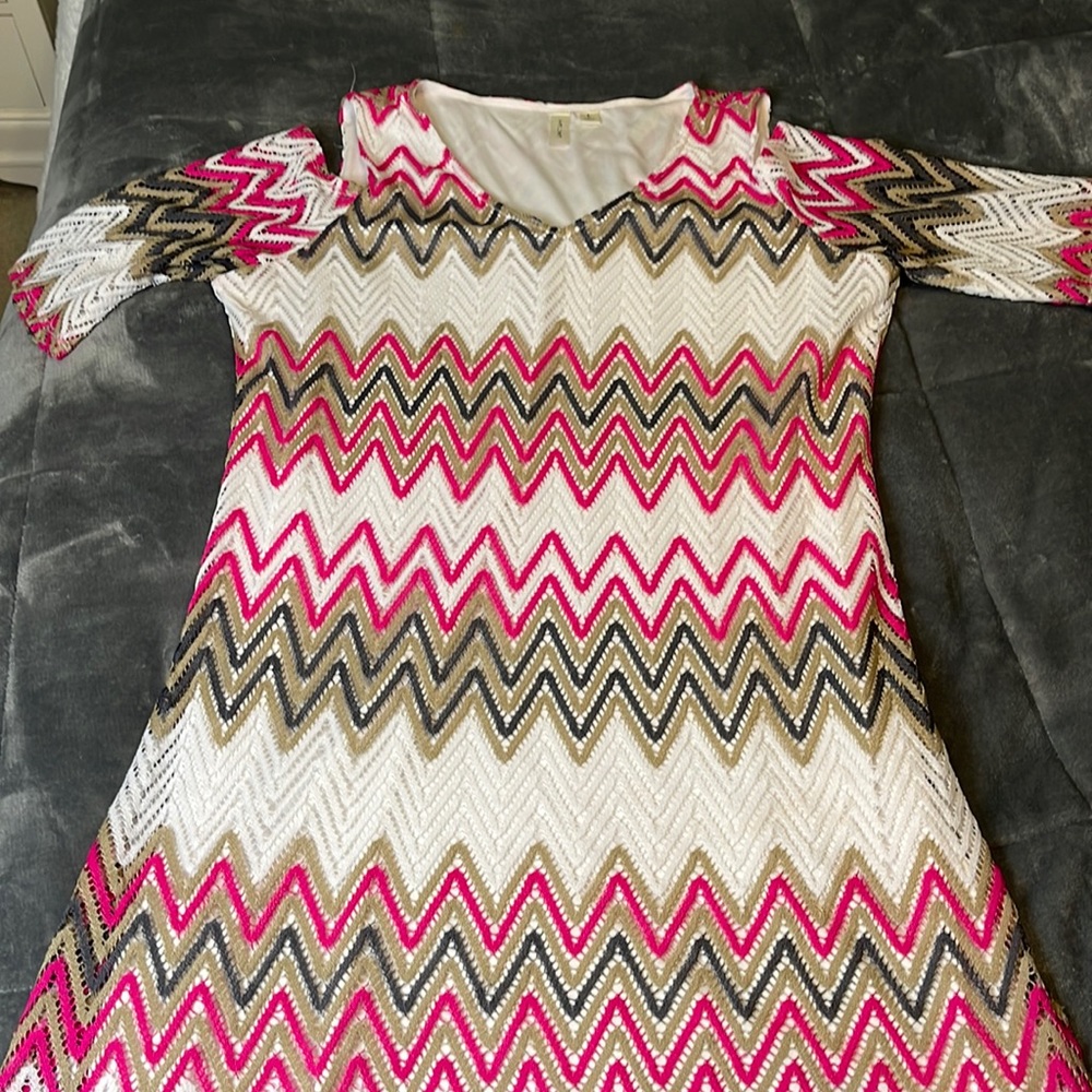 Pink, white, gold, and grey patterned dress